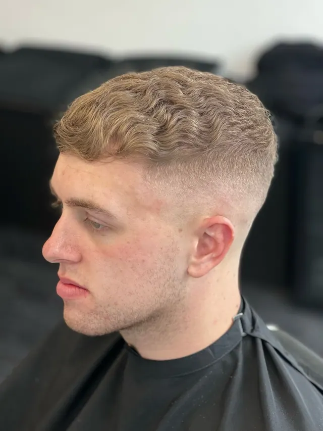 A curly crop and fade at Fletchers